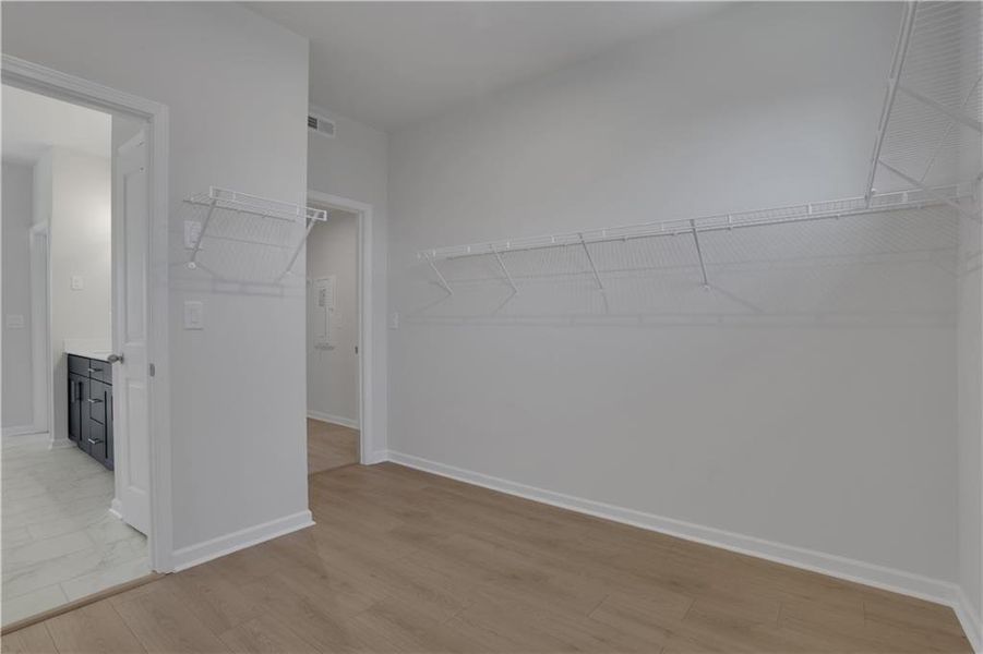 Spacious, unfurnished interior of a new home in The Paddocks at Doc Hughes, Buford (Image 26).