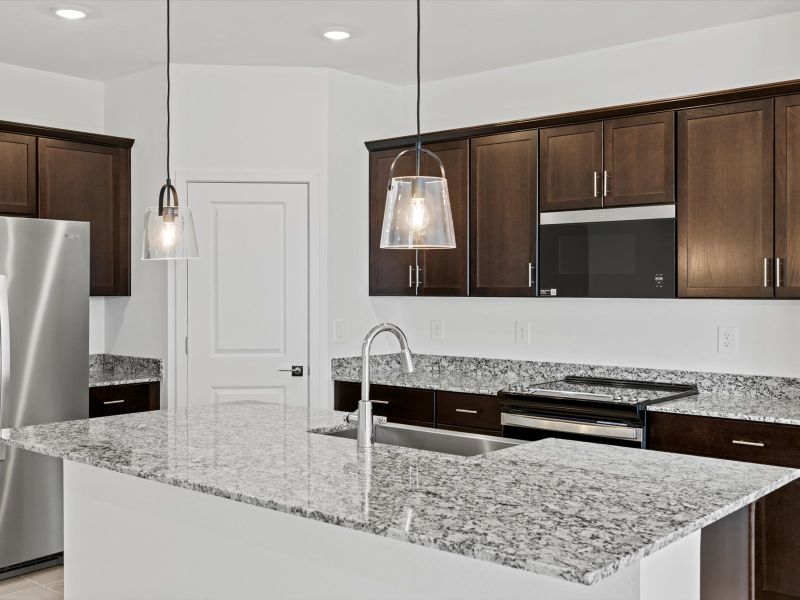 Furnished interior view inside a new home in Mountain View Estates Reserve Series, Buckeye (Image 3).