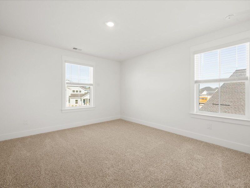 Spacious, unfurnished interior of a new home in The Coves at Lakes of Cane Bay II, Summerville (Image 31). Spacious, unfurnished interior of a new home in The Coves at Lakes of Cane Bay II, Summerville (Image 31).