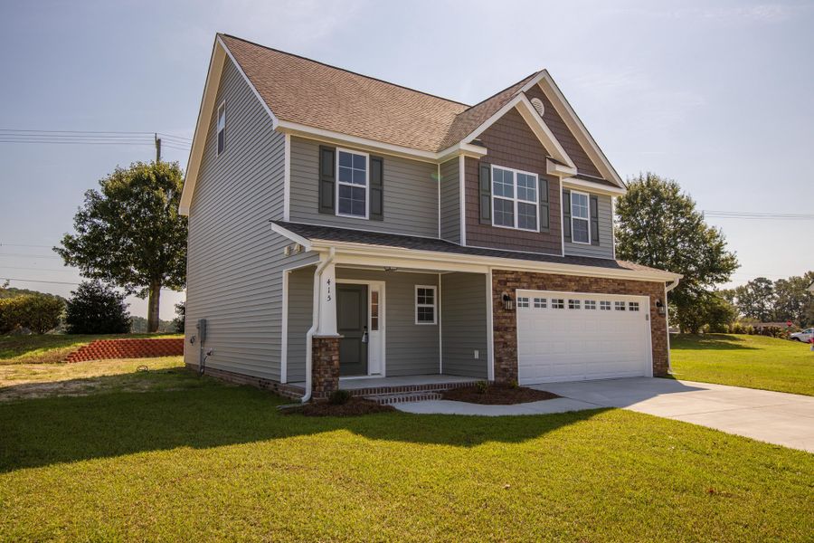 Representative exterior photo of a completed home built from the Rockbridge by Bill Clark Homes in Davenport Farms, Winterville, NC (Image 29).