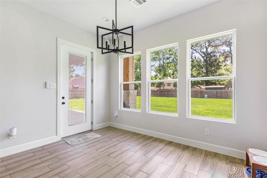 Dining Area with Backyard Access