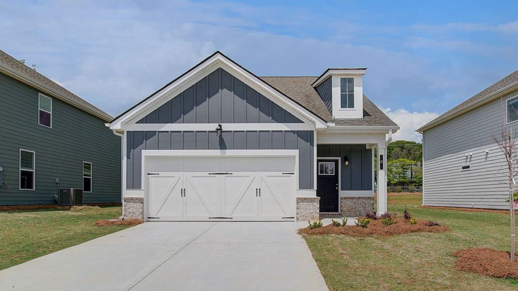 Representative exterior photo of a completed home built from the Emma by DRB Homes in Enclave at Evergreen, Fairburn, GA (Image 21).