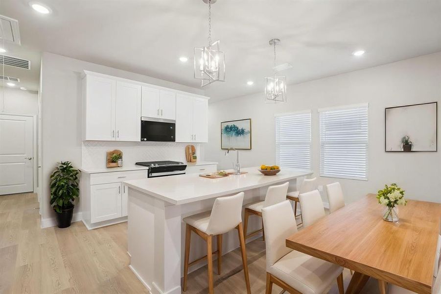 Furnished interior view inside a new home in Parks at Foster Crossing - Spring Series, Anna (Image 8).