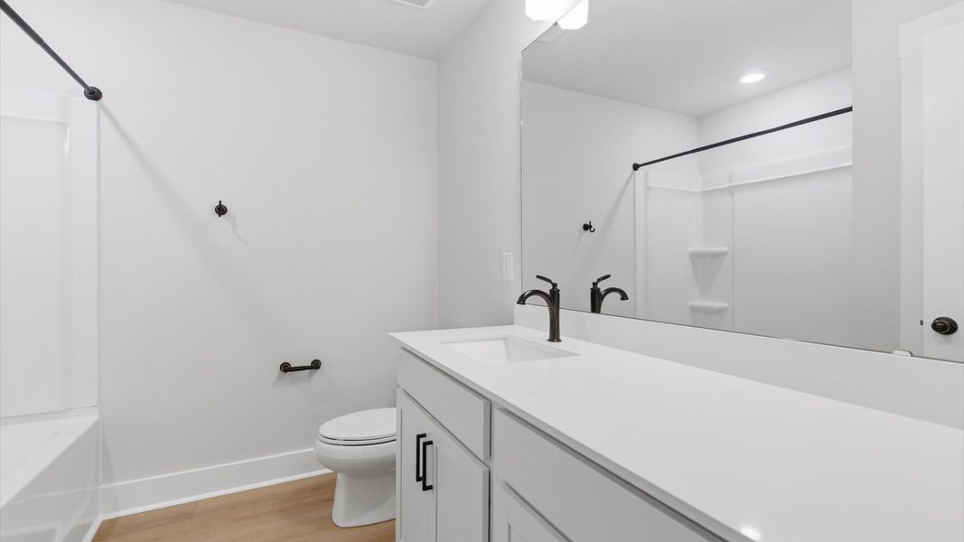 Furnished interior view inside a new home in Village at Midway, Anderson (Image 26).