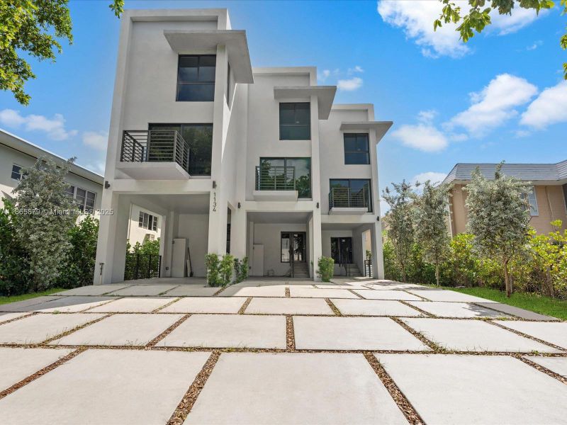 Front exterior of a new home in , Miami Beach, FL, highlighting curb appeal (Image 23). Front exterior of a new home in , Miami Beach, FL, highlighting curb appeal (Image 23).