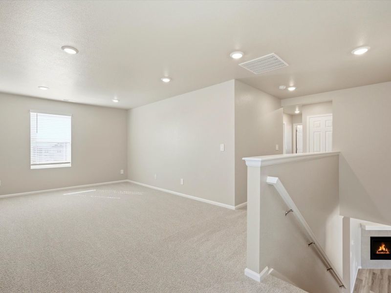 Spacious, unfurnished interior of a new home in Buffalo Highlands: The Flora Collection, Commerce City (Image 10).