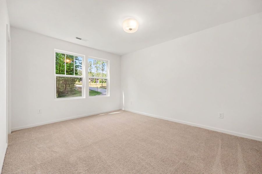 Spacious, unfurnished interior of a new home in Lake Royale, Louisburg (Image 18).