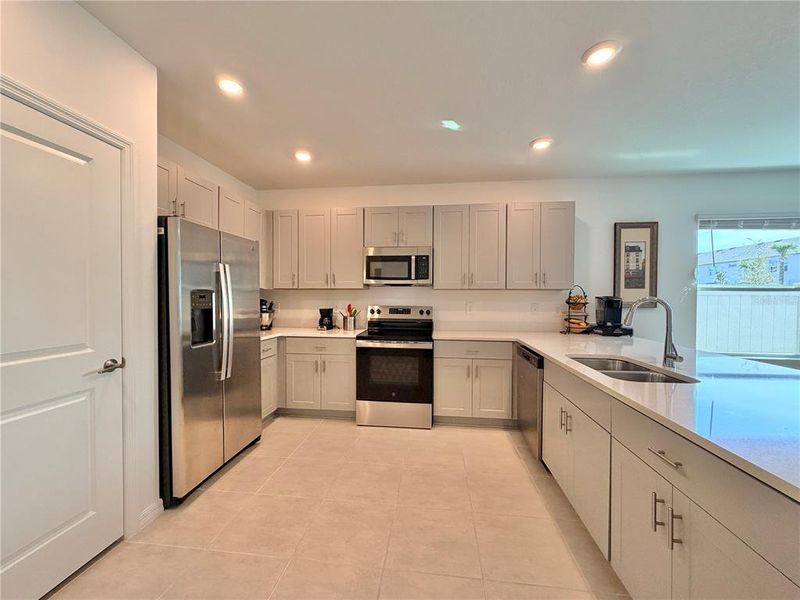 Furnished interior view inside a new home in Westview Community Group Page, Kissimmee (Image 10).