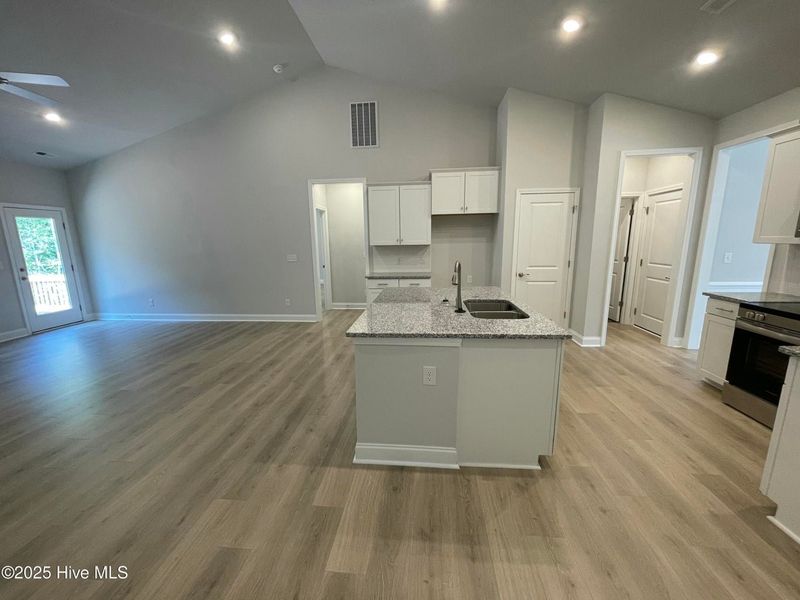 Furnished interior view inside a new home in Mill Creek Cove, Bolivia (Image 4).