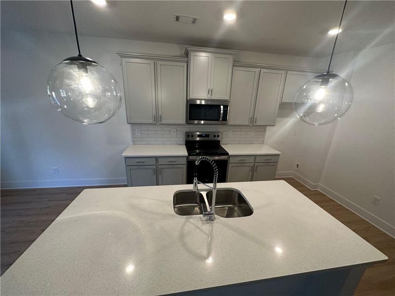 Furnished interior view inside a new home in , Buford (Image 5).