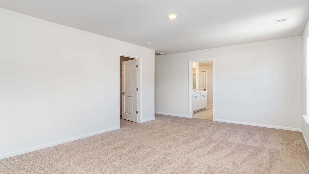 Spacious, unfurnished interior of a new home in Auberon Woods, Conway (Image 14).