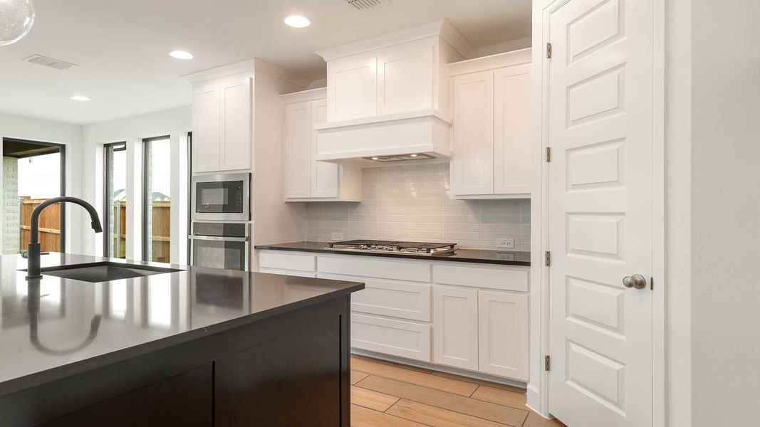 Furnished interior view inside a new home in Cambridge Crossing, Celina (Image 11).