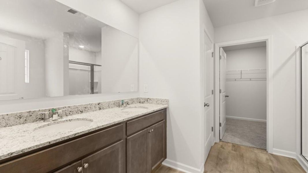 Furnished interior view inside a new home in Northwoods at Mirror Lake, Villa Rica (Image 6).