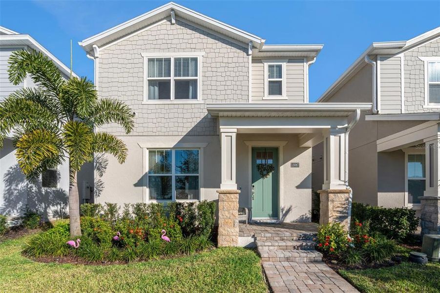 Front exterior of a new home in , Winter Garden, FL, highlighting curb appeal (Image 26).