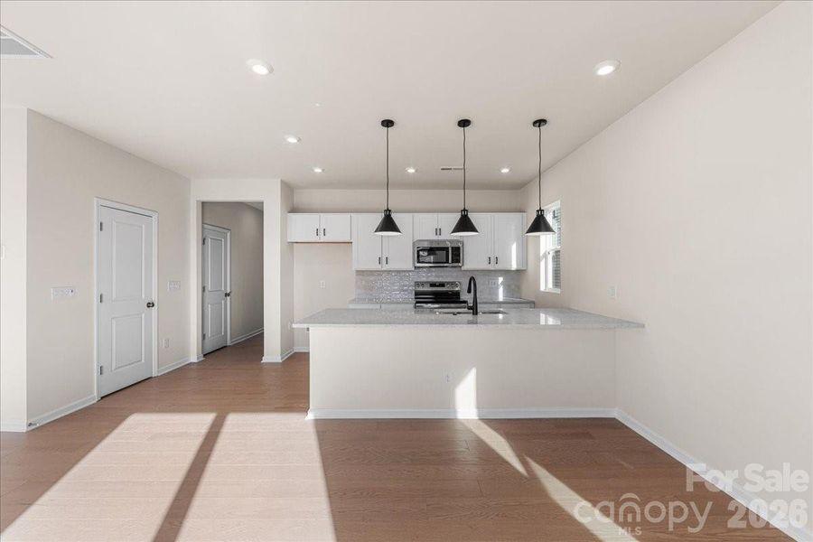 Chef's Dream Kitchen Layout at the Front of the Home.