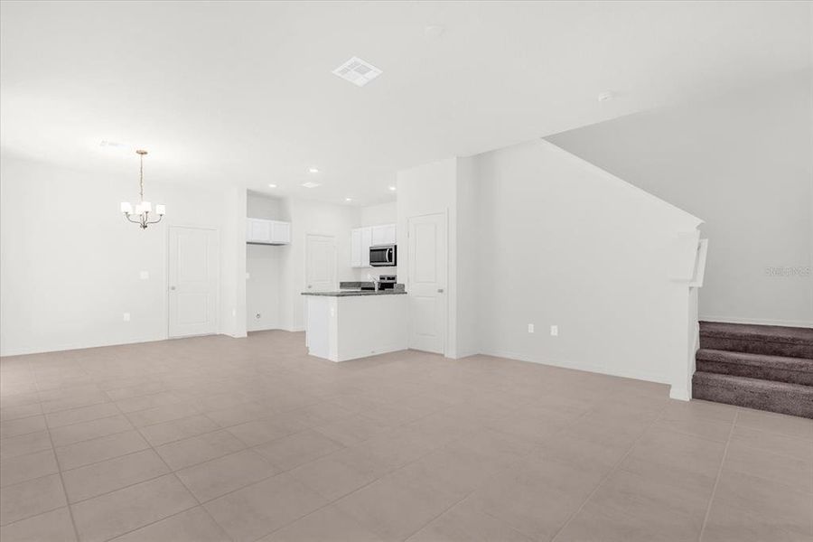 Spacious, unfurnished interior of a new home in Bellaviva III at Westside, Davenport (Image 13).