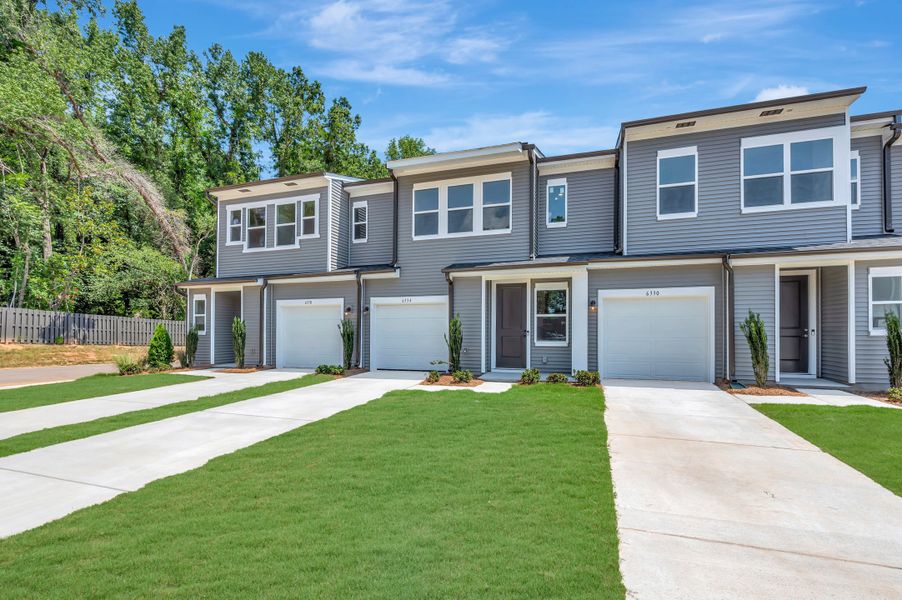 Front exterior of a new home in Amplitude, Charlotte, NC, highlighting curb appeal (Image 15). Front exterior of a new home in Amplitude, Charlotte, NC, highlighting curb appeal (Image 15).