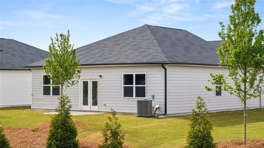 Exterior details and patio area of a home in Champion's Run, Lithonia (Image 3).
