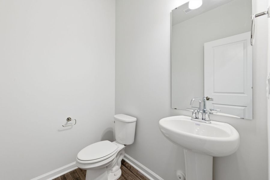 Furnished interior view inside a new home in Poets Walk, Whitsett (Image 10).