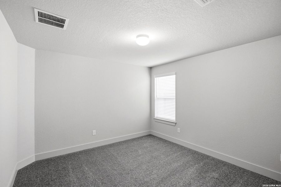 Spacious, unfurnished interior of a new home in Stillwater Ranch, San Antonio (Image 30).