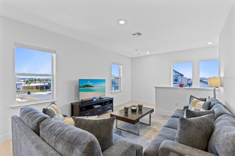Furnished interior view inside a new home in Laureate Park, Orlando (Image 40).