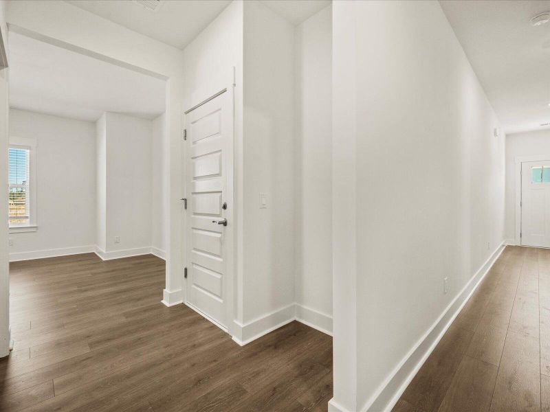 Spacious, unfurnished interior of a new home in The Coves at Lakes of Cane Bay, Summerville (Image 13). Spacious, unfurnished interior of a new home in The Coves at Lakes of Cane Bay, Summerville (Image 13).