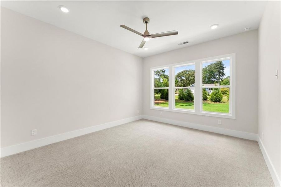 Spacious, unfurnished interior of a new home in Hillgrove Preserve, Powder Springs (Image 32).
