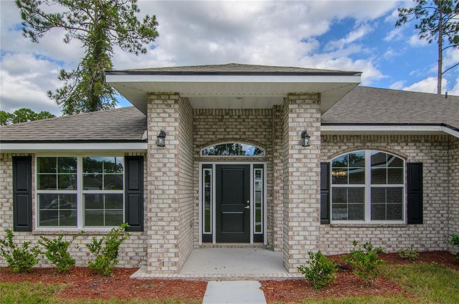 Exterior details and patio area of a home in , Palm Coast (Image 21).