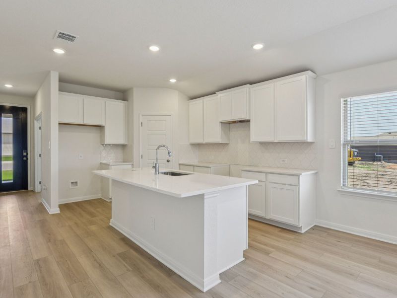 Kitchen in the Allen floorplan at a Meritage Homes community. Kitchen in the Allen floorplan at a Meritage Homes community.