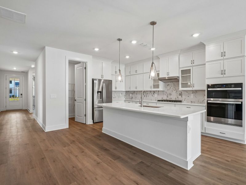 Furnished interior view inside a new home in Station Hill - Estate Series, Franklin (Image 4).