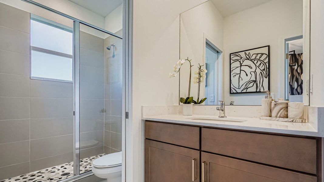 Representative furnished interior of a home built from the Waverly by D.R. Horton in Lakeside Landing, Royal Palm Beach (Image 19).