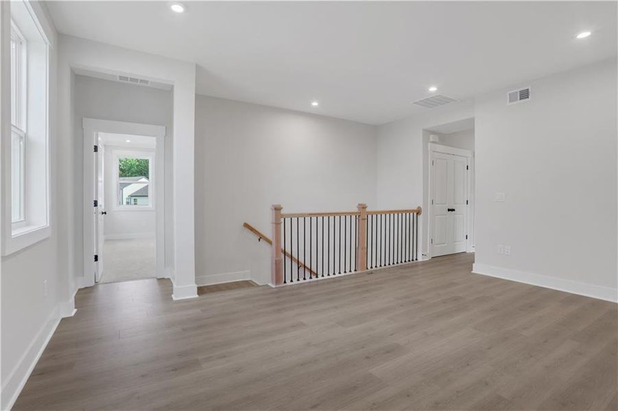 Spacious, unfurnished interior of a new home in The Paddocks at Doc Hughes, Buford (Image 43).