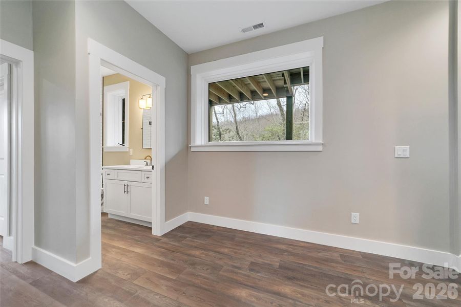 Spacious, unfurnished interior of a new home in , Pisgah Forest (Image 21).