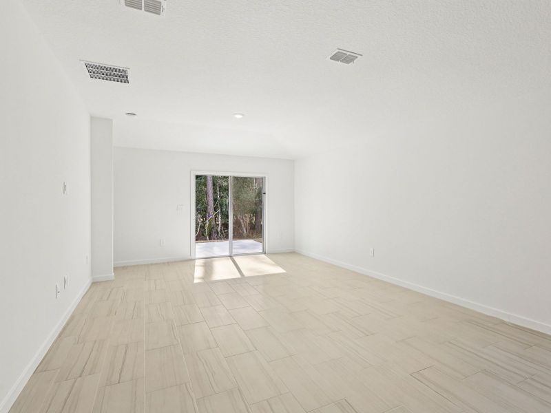 Spacious, unfurnished interior of a new home in Flagler Village - Classic Series, Palm Coast (Image 11).