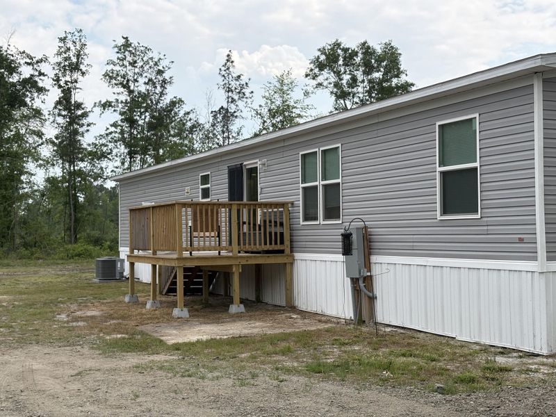 Exterior details and patio area of a home in , Cottageville (Image 19).