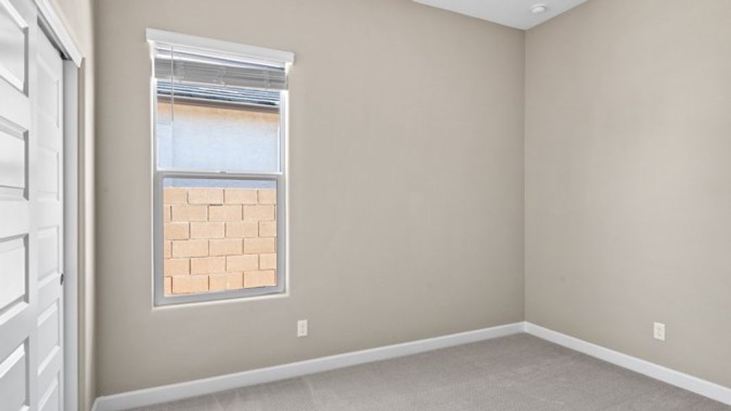 Spacious, unfurnished interior of a new home in Apache Farms, Buckeye (Image 21).