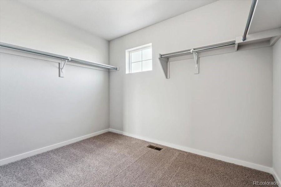 Spacious, unfurnished interior of a new home in Red Barn Meadows, Mead (Image 17).