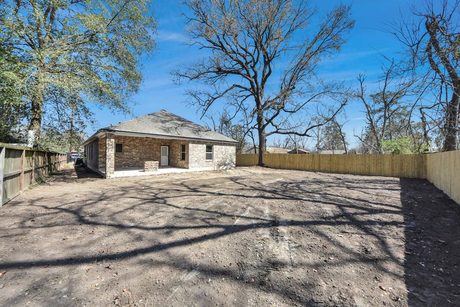 Exterior details and patio area of a home in , Houston (Image 4).