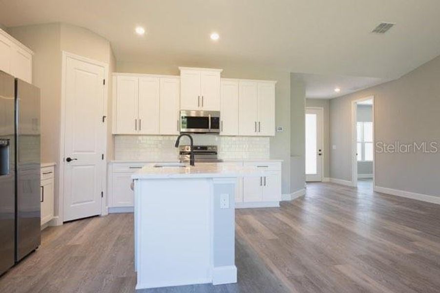 Furnished interior view inside a new home in , Ocala (Image 3).