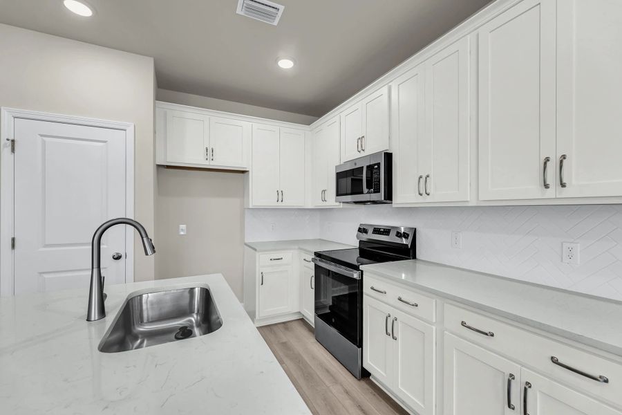 Furnished interior view inside a new home in Windward Village, Summerville (Image 4).