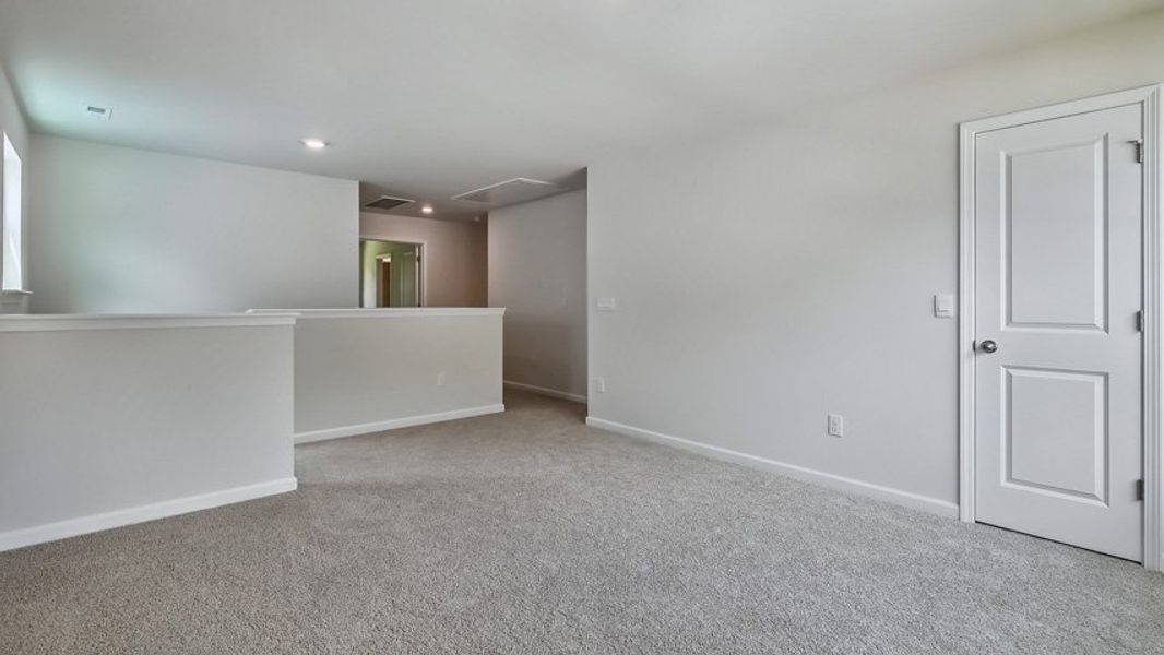 Spacious, unfurnished interior of a new home in The Estates at Edinborough, Gibsonville (Image 25).