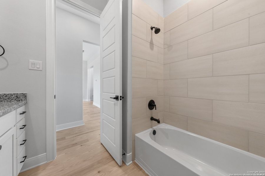 Furnished interior view inside a new home in Potranco West, Castroville (Image 12).