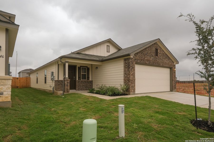 Front exterior of a new home in Park Place, New Braunfels, TX, highlighting curb appeal (Image 25).