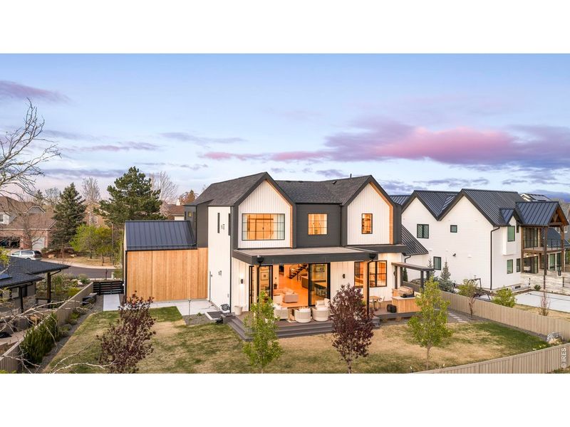 Front exterior of a new home in , Louisville, CO, highlighting curb appeal (Image 24).