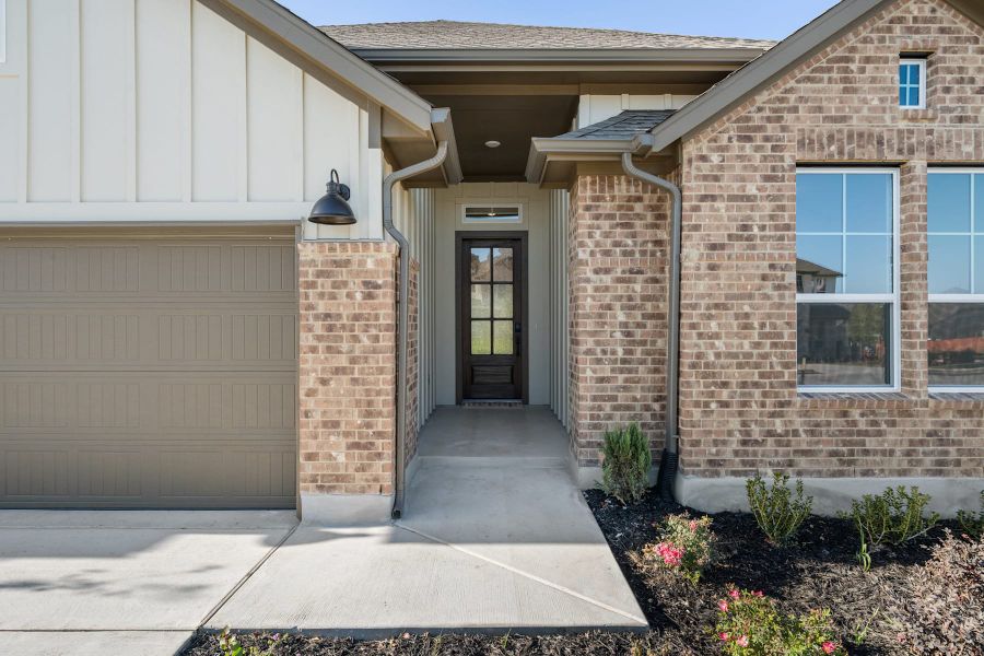Exterior details and patio area of a home in Lariat, Liberty Hill (Image 3).