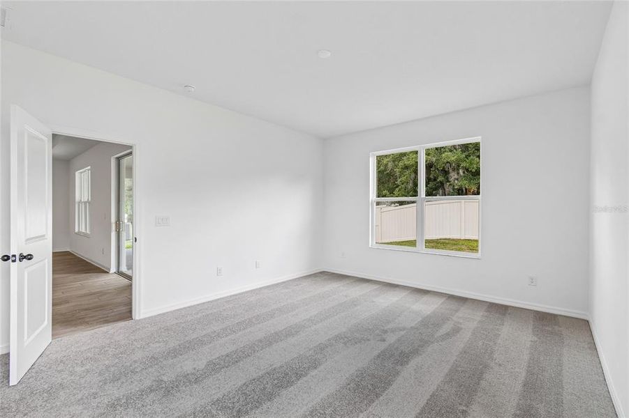 Spacious, unfurnished interior of a new home in Cascades at Southern Hills, Brooksville (Image 53).