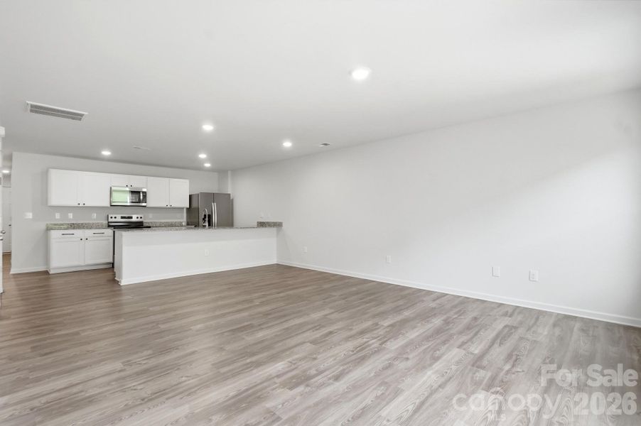 Spacious, unfurnished interior of a new home in Trivium, Newton (Image 23).