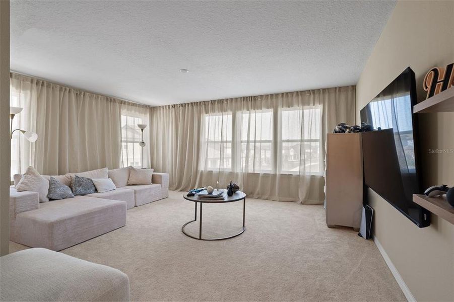 Furnished interior view inside a new home in , Winter Garden (Image 11).