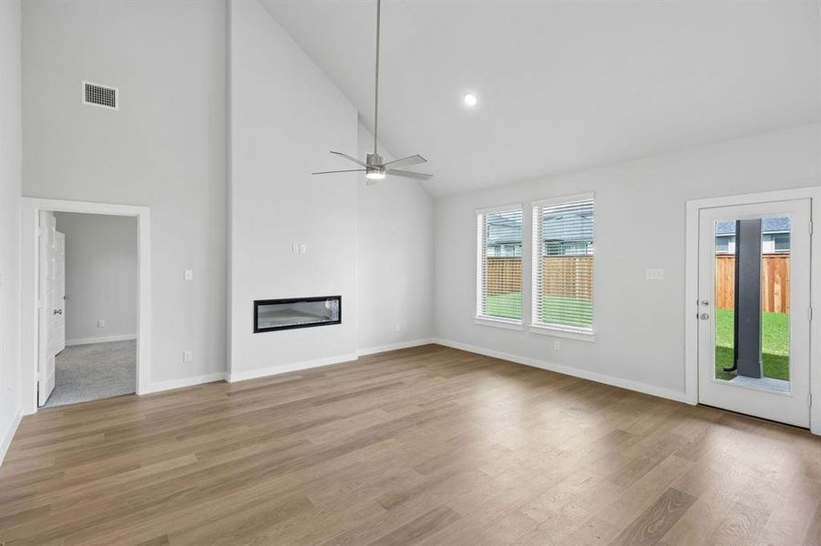 Living and Dining Room in the Winters home plan by Trophy Signature Homes – REPRESENTATIVE PHOTO