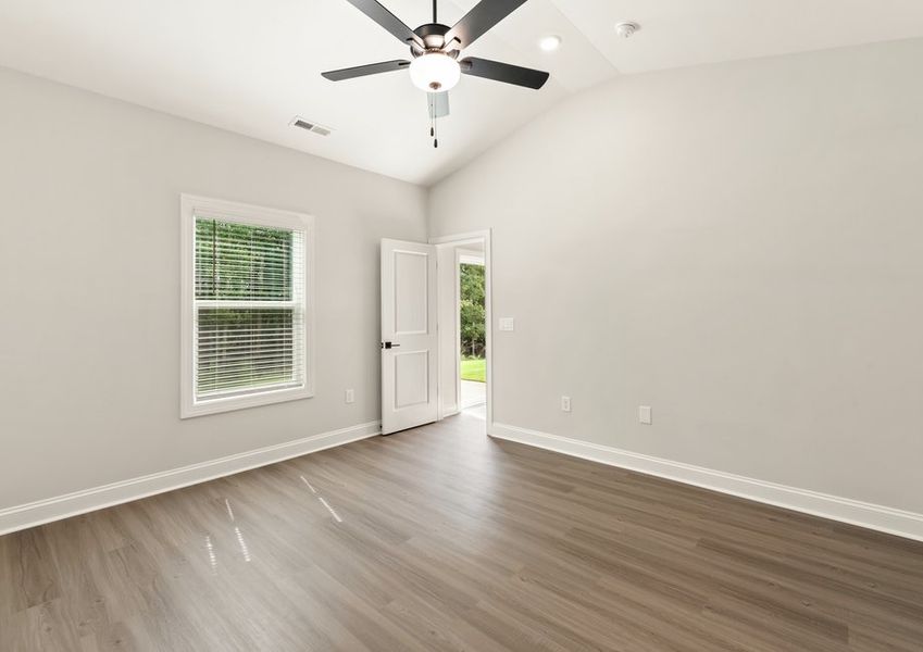 The master bedroom has enough space for your king-sized furniture.